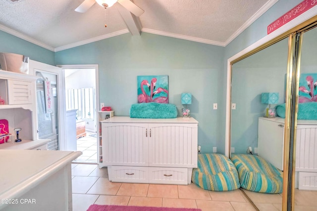 101 Gulf Loop, Panama City Beach, FL 32408 - bathroom featuring ceiling fan, tile patterned floors, a textured ceiling, crown molding, and lofted ceiling