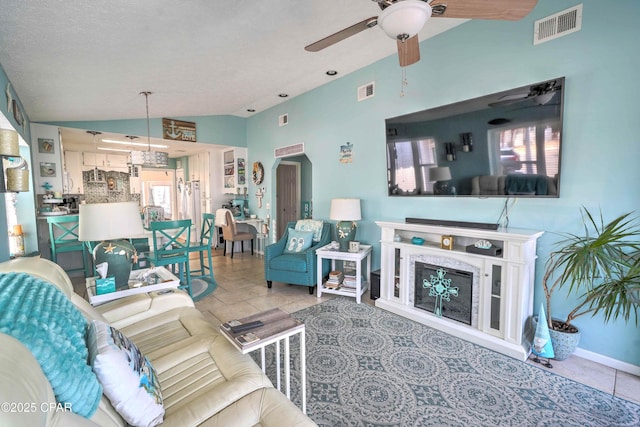 101 Gulf Loop, Panama City Beach, FL 32408 - living area with vaulted ceiling and a ceiling fan