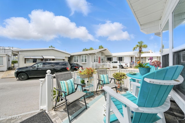 101 Gulf Loop, Panama City Beach, FL 32408 - porch featuring a residential view