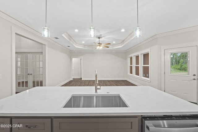 902 Captain Way, Panama City, FL 32404 - kitchen with gray cabinets, open floor plan, stainless steel dishwasher, crown molding, and recessed lighting