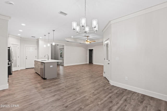 902 Captain Way, Panama City, FL 32404 - kitchen featuring open floor plan, crown molding, a chandelier, wood finished floors, and a ceiling fan