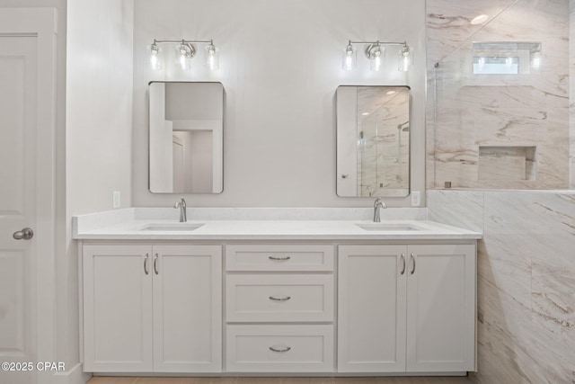 902 Captain Way, Panama City, FL 32404 - bathroom with a marble finish shower and double vanity