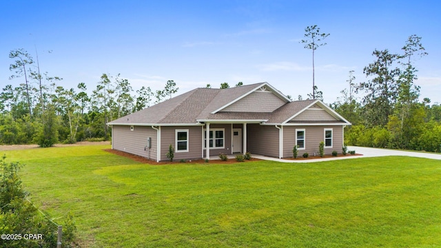 902 Captain Way, Panama City, FL 32404 - view of front of home featuring a front yard and roof with shingles