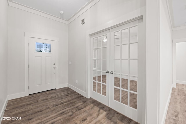 902 Captain Way, Panama City, FL 32404 - entrance foyer featuring french doors, wood finished floors, and ornamental molding