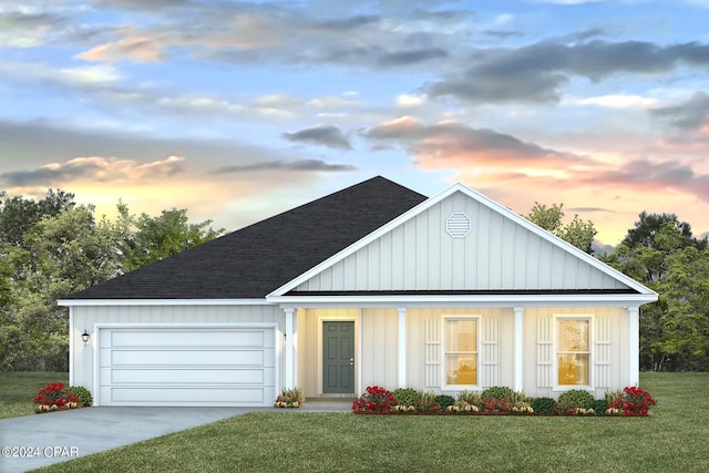 4866 Windrow Way, Panama City, FL 32404 - view of front of home featuring roof with shingles, driveway, a front yard, an attached garage, and board and batten siding