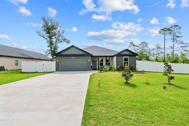 8422 Resota Beach Rd, Southport, FL 32409 - view of front of home with concrete driveway and a garage