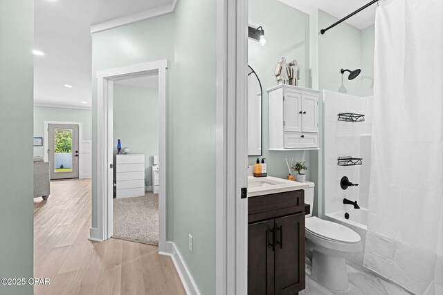 8422 Resota Beach Rd, Southport, FL 32409 - bathroom featuring vanity, shower / bathtub combination with curtain, wood finished floors, and recessed lighting
