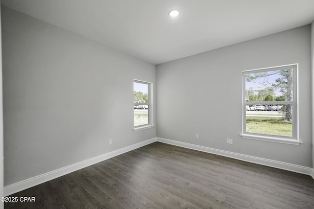 237 Mosaic Dr Unit 42, Port St Joe, FL 32456 - spare room featuring dark wood finished floors and recessed lighting