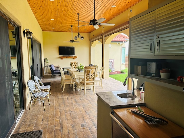 1733 Overhill Dr, San Angelo, TX 76904 - view of patio with ceiling fan, outdoor dining space, and a sink