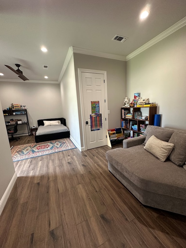 1733 Overhill Dr, San Angelo, TX 76904 - bedroom with wood finished floors, ornamental molding, recessed lighting, and baseboards