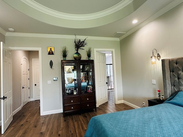 1733 Overhill Dr, San Angelo, TX 76904 - bedroom featuring wood finished floors, crown molding, and baseboards