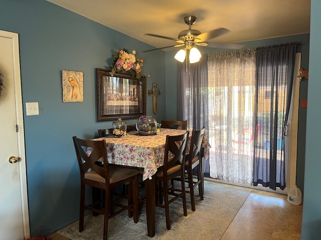 dining space with ceiling fan