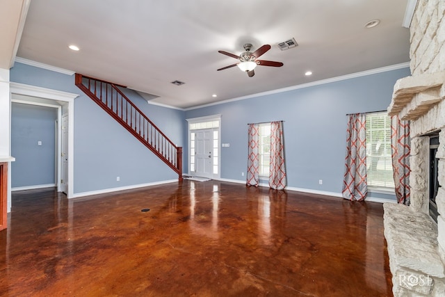 unfurnished living room with crown molding, visible vents, concrete flooring, a ceiling fan, and a stone fireplace