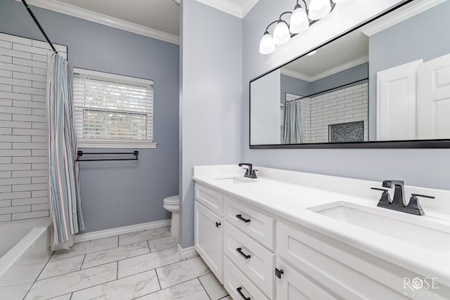 bathroom with crown molding, a sink, baseboards, toilet, and marble finish floor