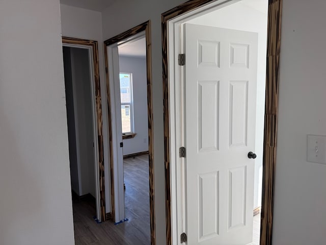 hallway featuring hardwood / wood-style flooring