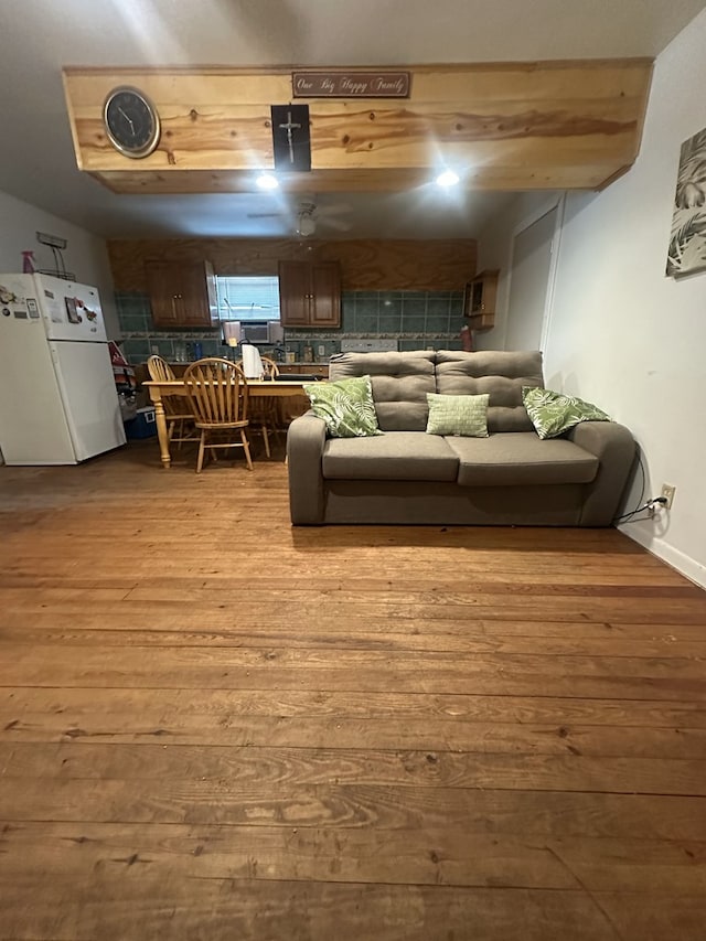 living room with light hardwood / wood-style flooring