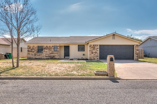 single story home with a garage and a front yard