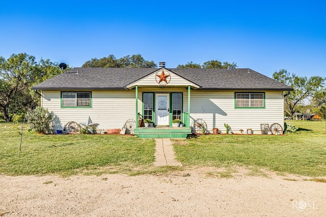 ranch-style house with a front yard