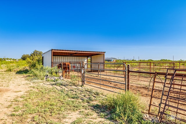 view of outdoor structure featuring a rural view