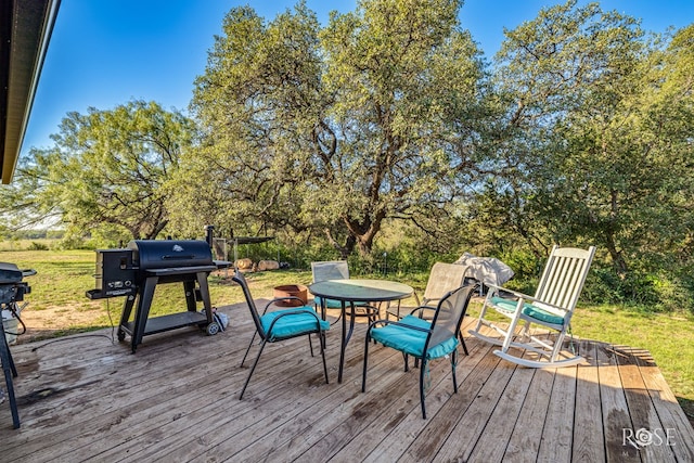 wooden terrace with grilling area