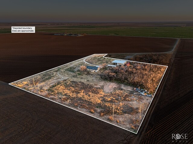 aerial view at dusk with a rural view