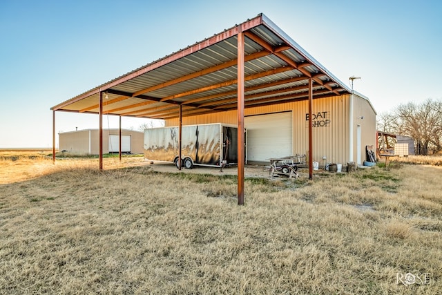 view of parking featuring a garage