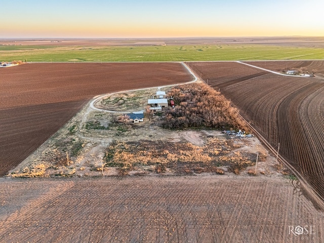 aerial view at dusk with a rural view