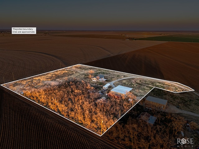 aerial view at dusk with a rural view