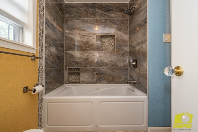 2720 Tanglewood Dr, San Angelo, TX 76904 - full bath with a textured wall and bathing tub / shower combination