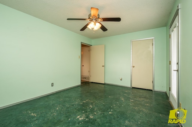 2720 Tanglewood Dr, San Angelo, TX 76904 - unfurnished bedroom featuring baseboards and ceiling fan