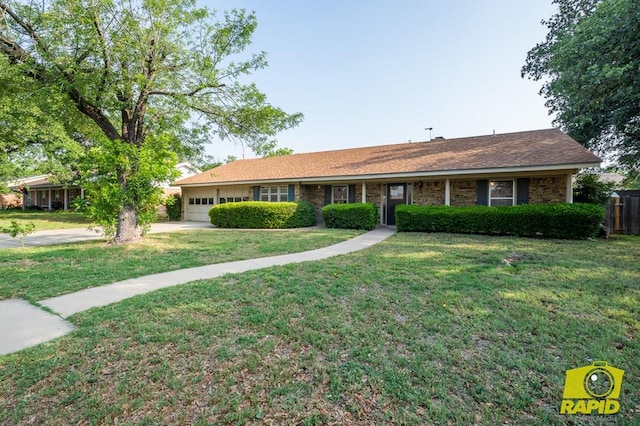 2720 Tanglewood Dr, San Angelo, TX 76904 - ranch-style home featuring an attached garage, a front yard, and driveway