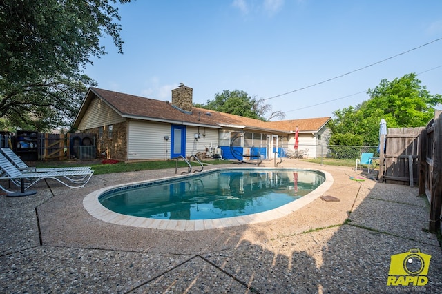 2720 Tanglewood Dr, San Angelo, TX 76904 - view of swimming pool with a fenced backyard and a patio