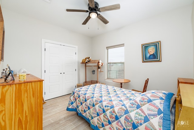 bedroom featuring a closet and ceiling fan