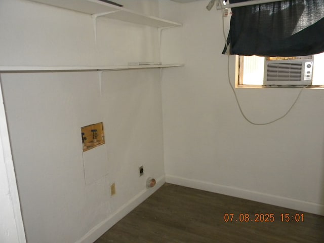 1611 N Magdalen St, San Angelo, TX 76901 - laundry room with washer hookup and dark wood finished floors