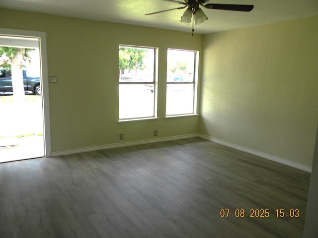 1611 N Magdalen St, San Angelo, TX 76901 - unfurnished room with ceiling fan, healthy amount of natural light, and wood finished floors