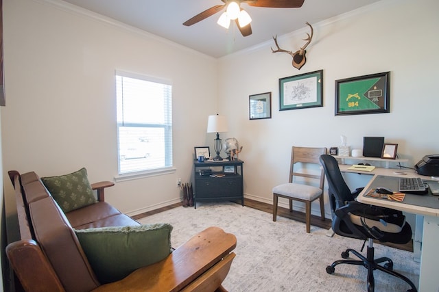 office with ornamental molding, ceiling fan, and light wood-type flooring