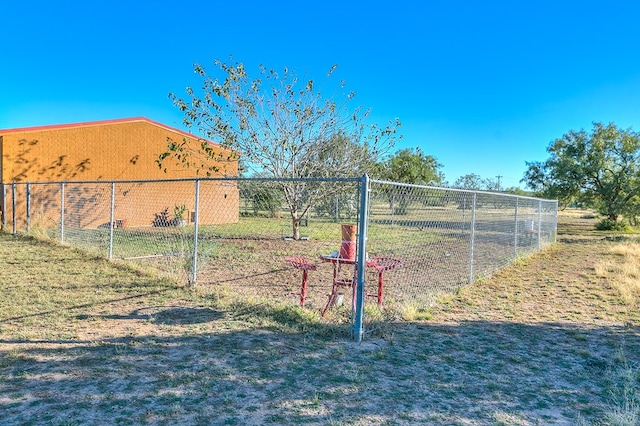 view of property's community featuring fence
