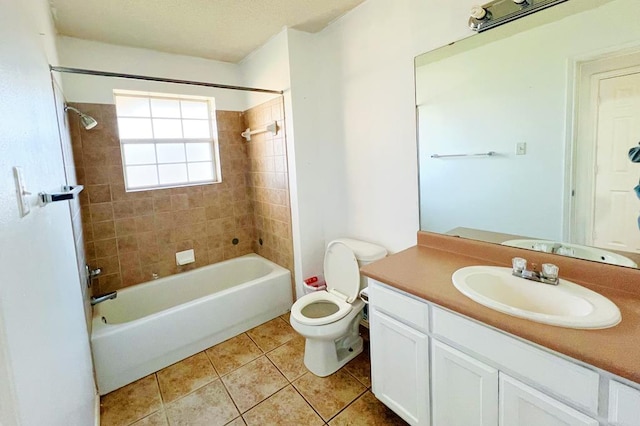 full bath with vanity, tile patterned floors, toilet, and bathtub / shower combination