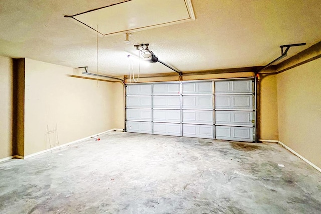 garage featuring baseboards