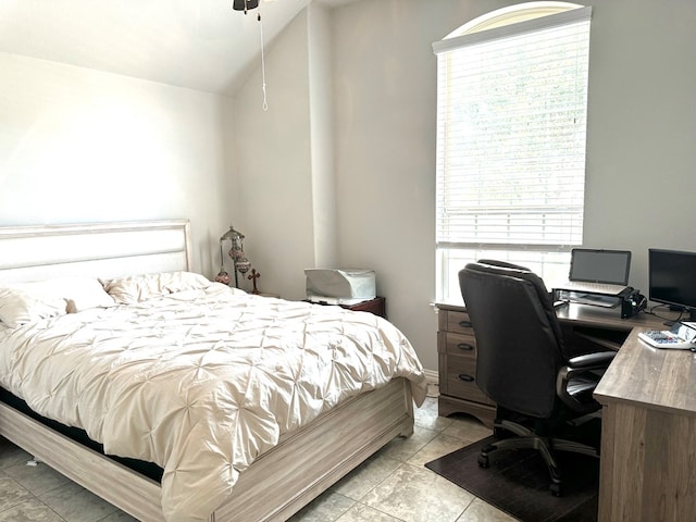 tiled bedroom with vaulted ceiling