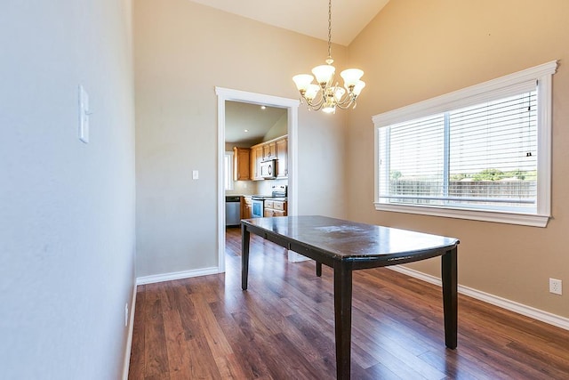 unfurnished dining area with lofted ceiling, dark hardwood / wood-style floors, and a notable chandelier