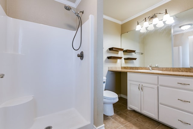 bathroom with toilet, vanity, walk in shower, crown molding, and tile patterned floors