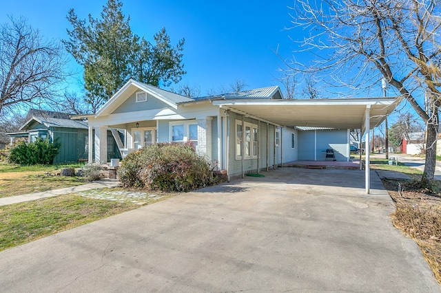 view of front of property with a carport