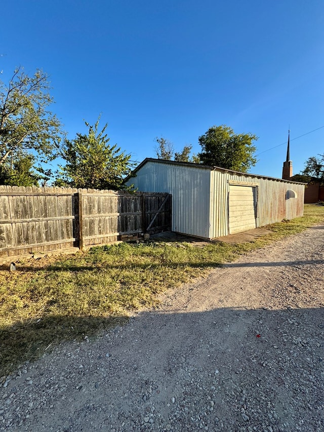 view of outbuilding with a garage