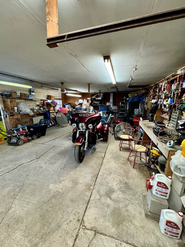 garage with a workshop area