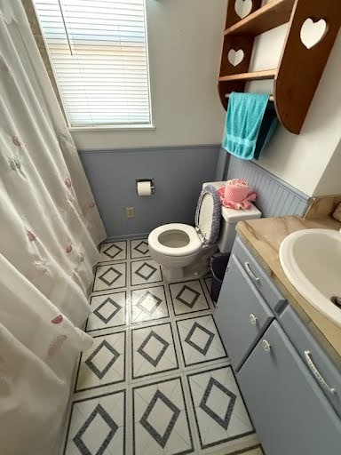 bathroom with vanity and toilet