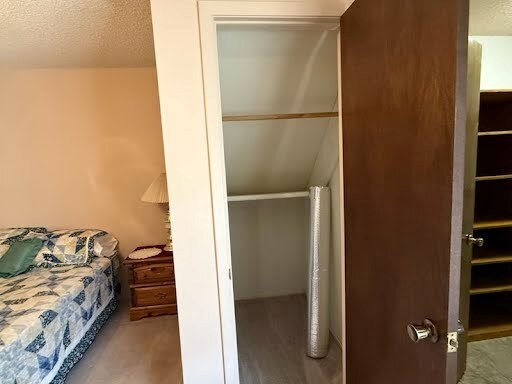 bedroom with a textured ceiling