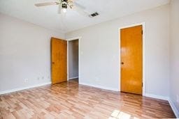 1246 E 20th St, San Angelo, TX 76903 - unfurnished room with a ceiling fan and wood finished floors