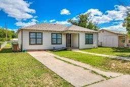 1246 E 20th St, San Angelo, TX 76903 - ranch-style house featuring concrete driveway and a front lawn