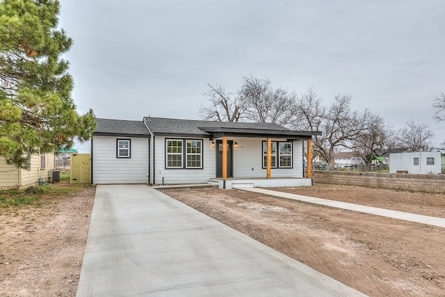 view of front of house featuring central AC unit and covered porch